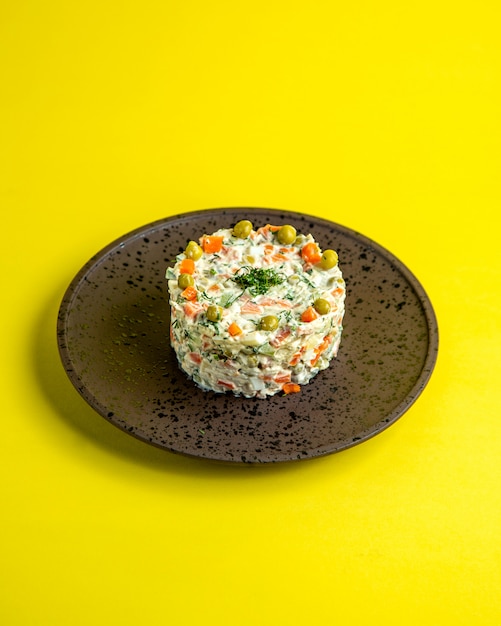 Free photo olivier salad  side view