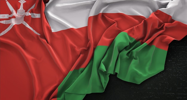 Free photo oman flag wrinkled on dark background 3d render