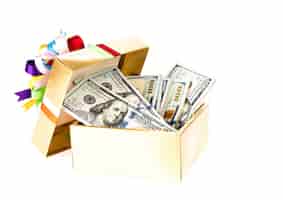 Free photo one hundred dollars banknotes in decorated gift box.