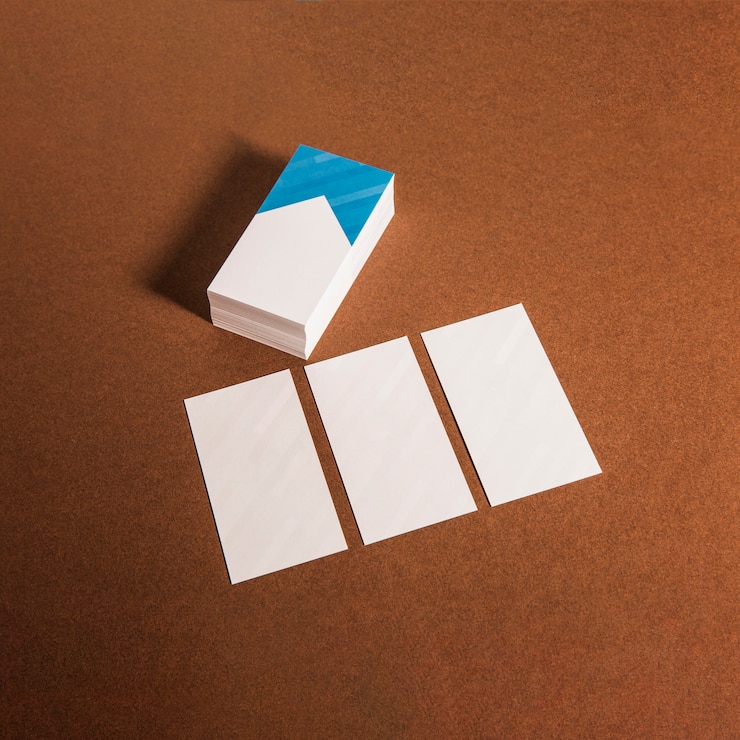 Free Photo one stack and three single business cards