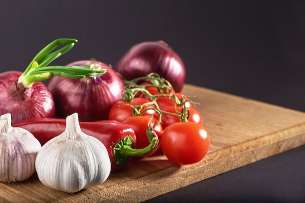 Onion and garlic and hot peppers and tomatoes.