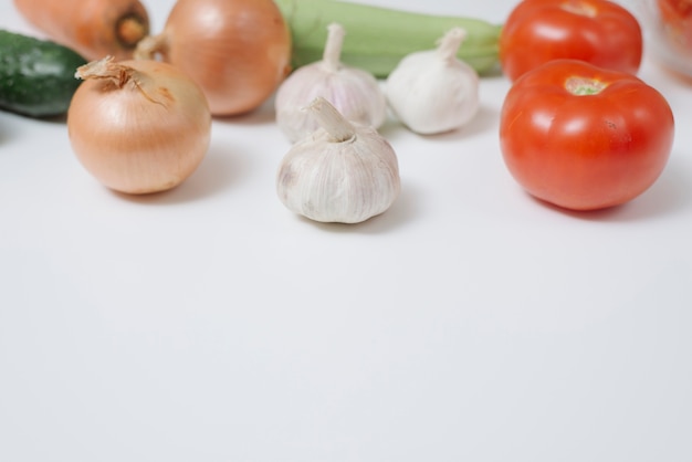 Free photo onion, garlic and tomato