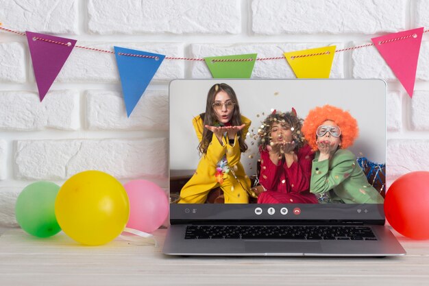 Online party celebration with laptop