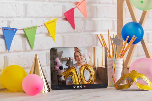 Online party celebration with tablet