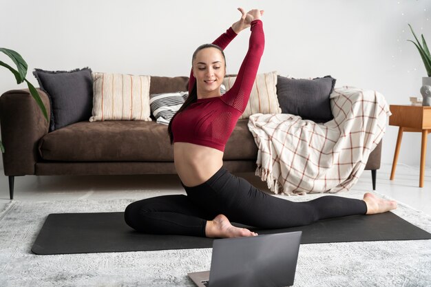 Online sport fitness instructor recording her session