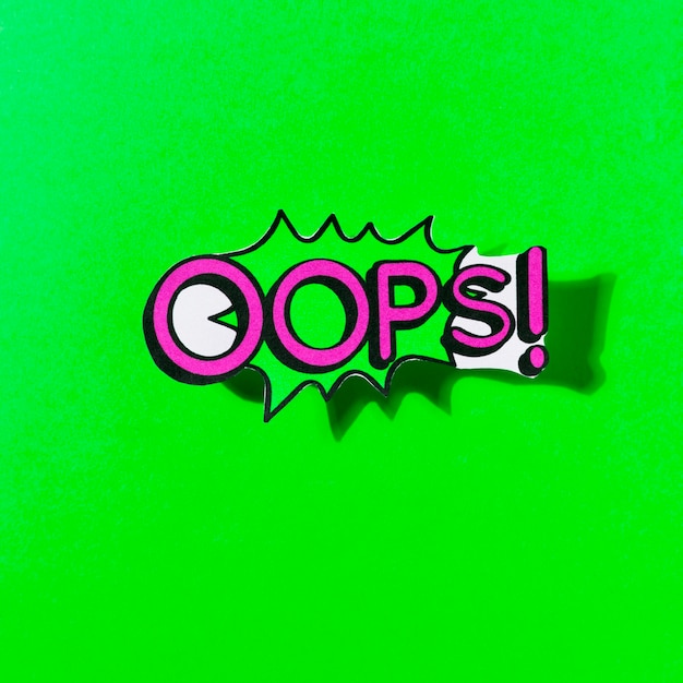 Free photo oops! message comic bubble speech cartoon expression on green background