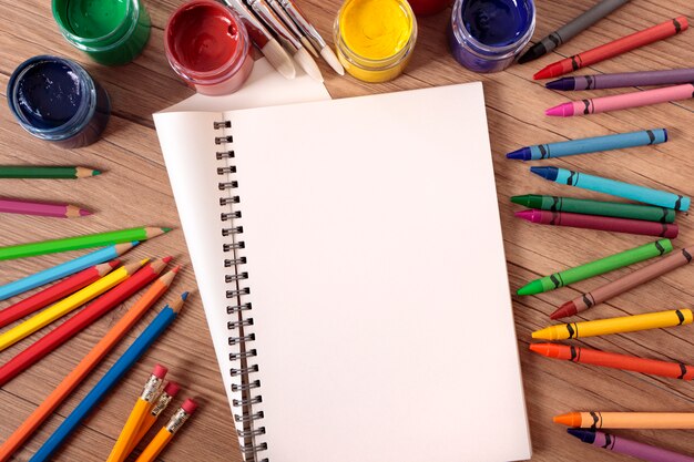 Free photo open book on school desk