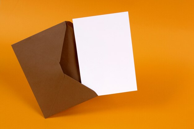 Open brown envelope with letter