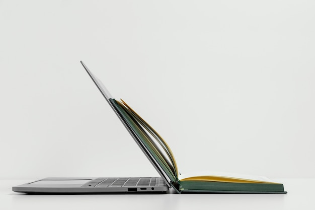 Open notebook and laptop arrangement