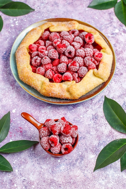 Free photo open pie, raspberry galette. summer berry dessert.