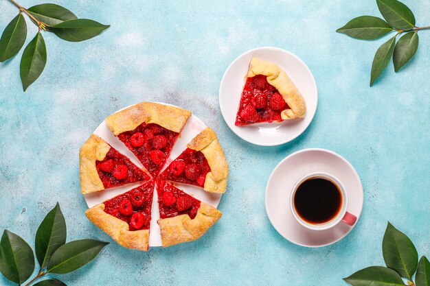 Open pie, raspberry galette. Summer berry dessert.
