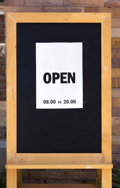 Open poster on a blackboard