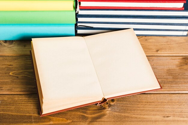 Opened book on wooden table