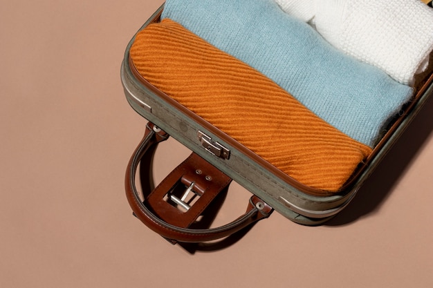 Opened luggage with clothes folded