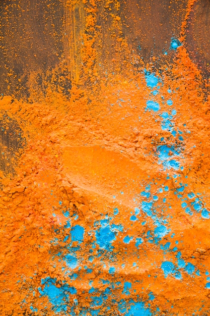 Orange blue powder on table