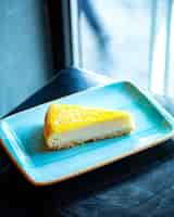 Free photo orange cheesecake on the table