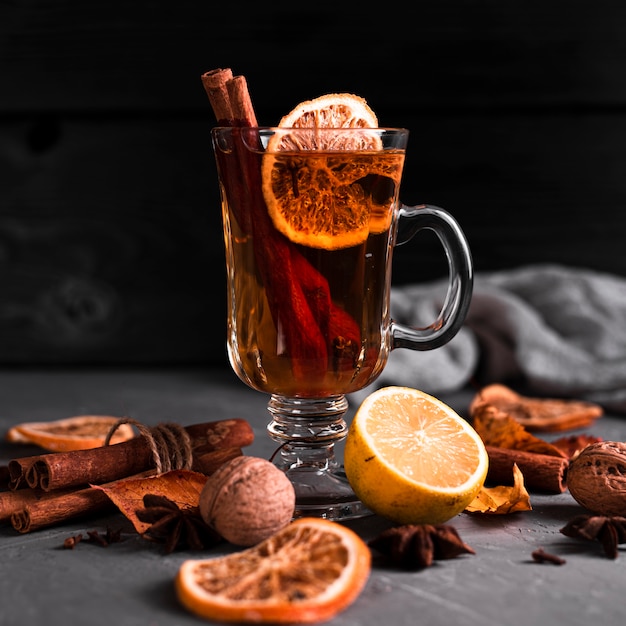 Orange and cinnamon tea with black background