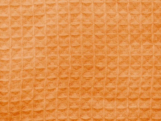 Orange cloth with seamless crocheted pattern