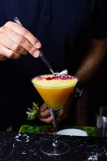 Orange cocktail on the table