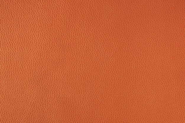 Orange fine leather textured background