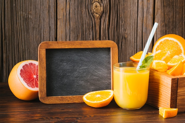 Orange and grapefruit juice with copy space