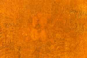 Free photo orange grunge wallpaper with noise filter