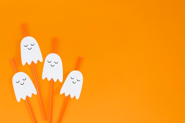 Orange halloween ghost straws set design resources