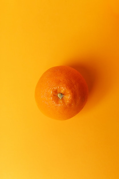 Orange isolated on orange surface