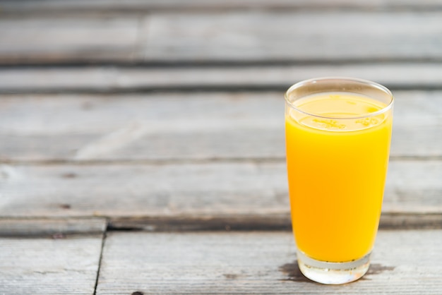 Free photo orange juice glass