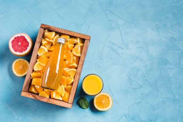 Orange juice and grapefruit with copyspace