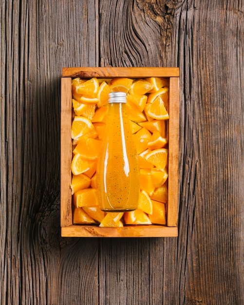 Orange juice on wooden background