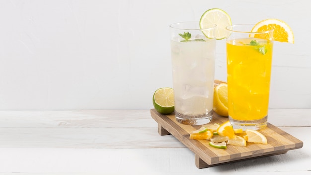 Free photo orange and lemon drink