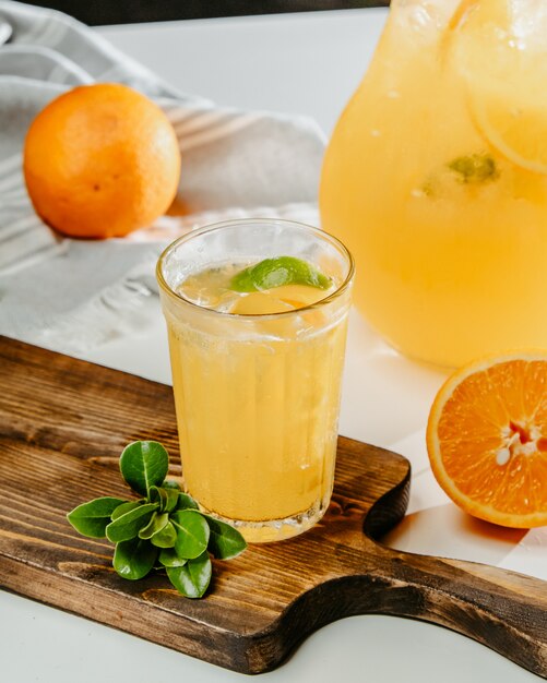 Orange and lemon lemonade with ice