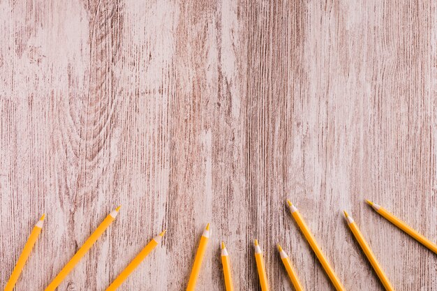 Orange pencils on desk