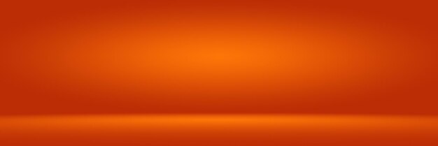 Orange photographic studio background vertical with soft vignette Soft gradient background Painted canvas studio backdrop