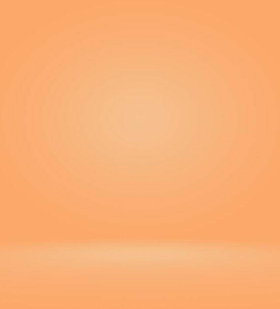 柔らかいビネットと垂直のオレンジ色の写真スタジオの背景。ソフトグラデーションの背景。ペイントされたキャンバススタジオの背景。