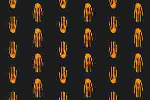 Free photo orange skeleton hands laid in even lines