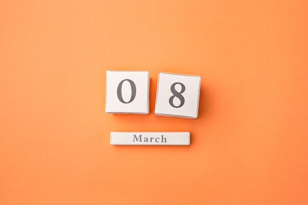 Orange table with wooden calendar