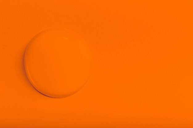 オレンジ色の水滴の背景