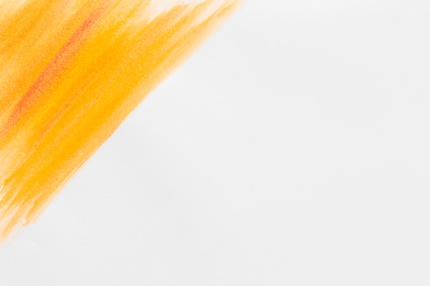 Free photo orange watercolor paint copy space