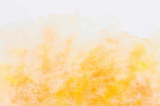 Free photo an orange watercolor textured background