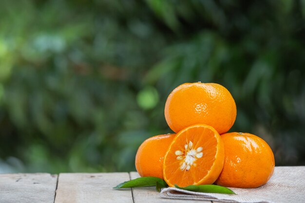 Oranges fruit with leaves