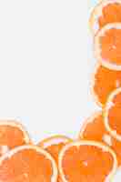 Free photo an oranges slices on isolated background