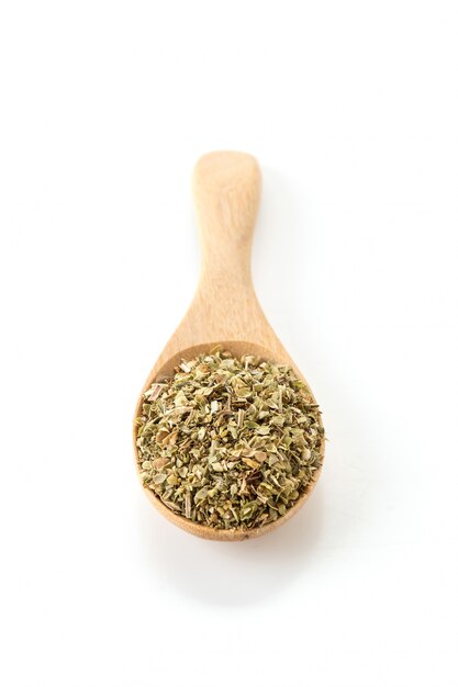 oregano on wood spoon