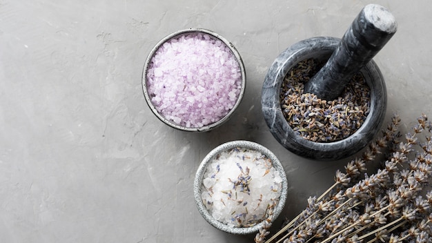 Organic detox salt and dried lavender leaves copy space