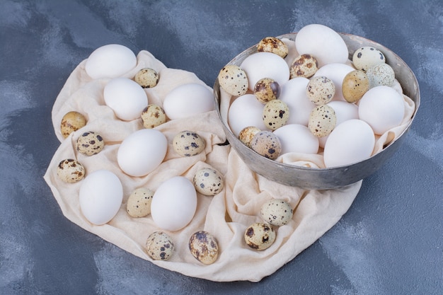 Organic eggs on piece of kitchen towel.