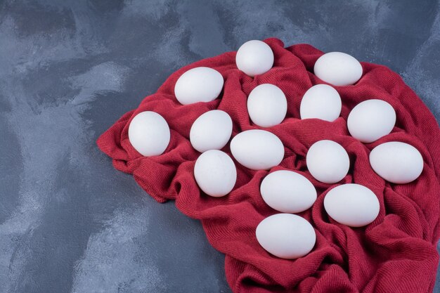 Organic eggs on a piece of kitchen towel.