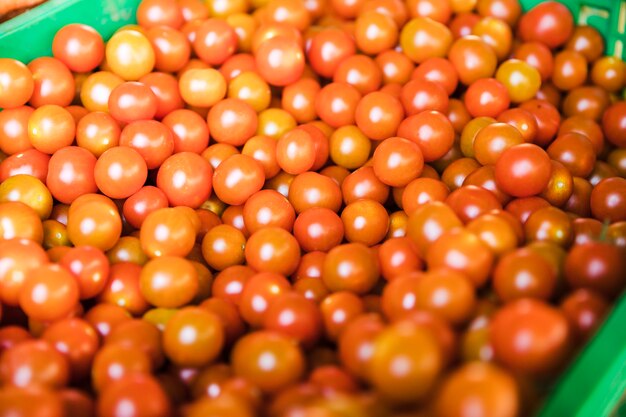 Organic juicy tomatoes for sale on street market