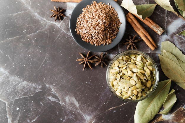 Organic seeds and dried star anise flowers