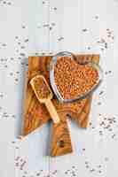 Free photo organic uncooked buckwheat in bowl,top view